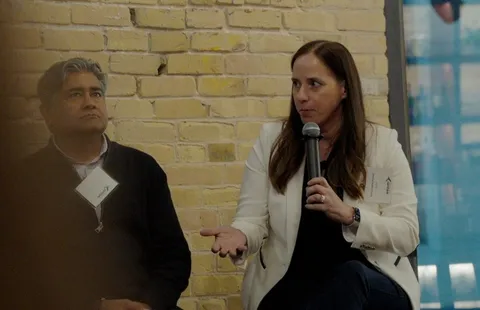 Emily Lewis-Pinnell speaking on the AI Shockwave panel at SXSW 2026